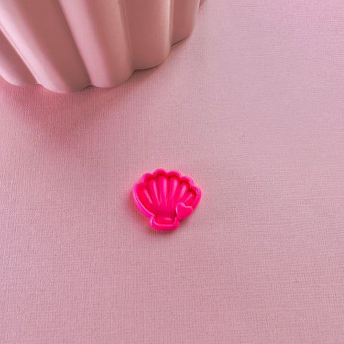 Pin’s coquillage rose fluo