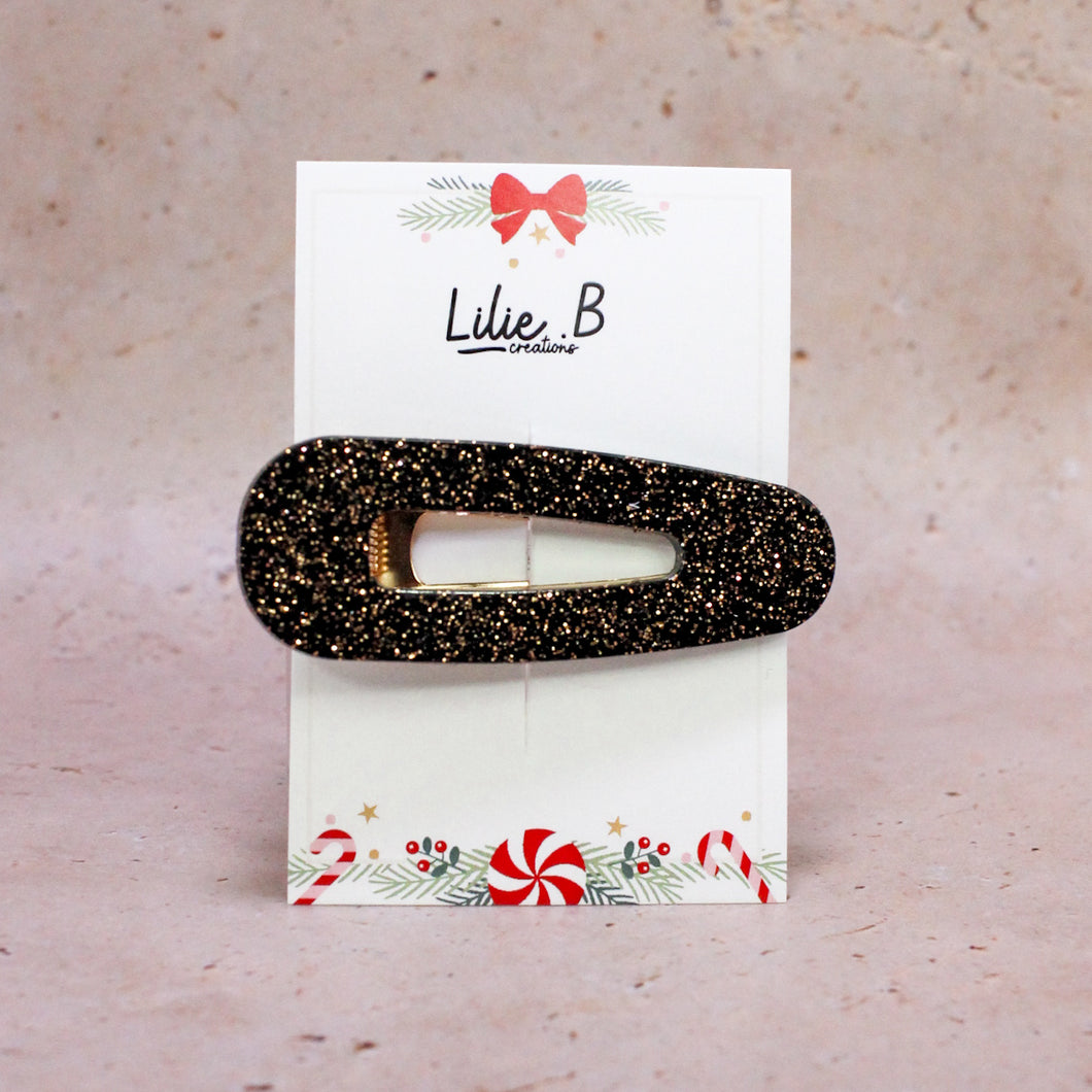 Poppie Clip Noir et paillettes or