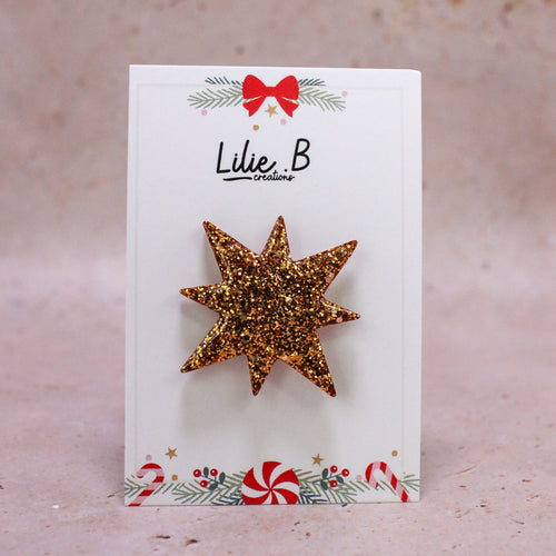 Pin’s Étoile polaire paillettes or