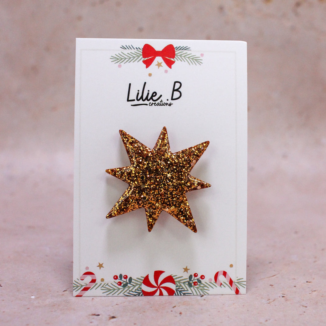 Pin’s Étoile polaire paillettes or